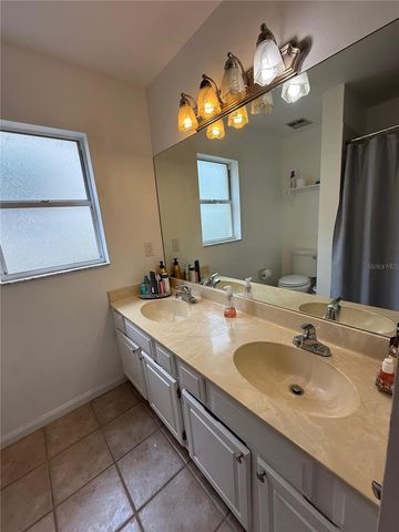 7736 ROLLINGRIDGE COURT, Orlando, FL 32835