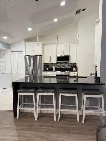 7736 ROLLINGRIDGE COURT, Orlando, FL 32835