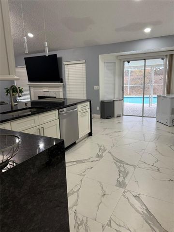 7736 ROLLINGRIDGE COURT, Orlando, FL 32835