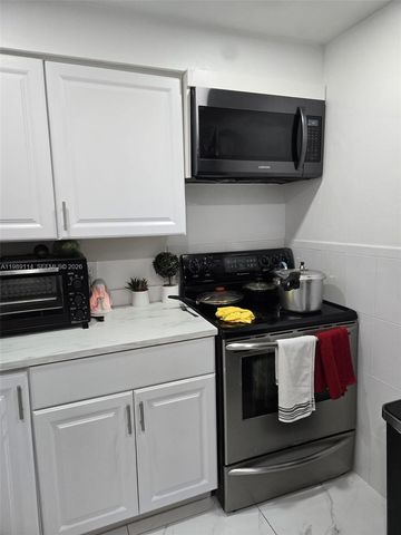 6195 Rock Island Rd 409, Tamarac, FL 33319