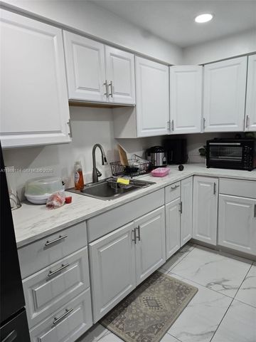 6195 Rock Island Rd 409, Tamarac, FL 33319