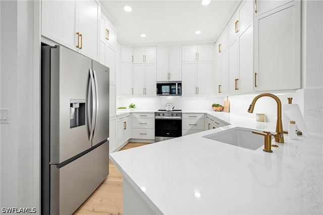9033 Calypso CT, Naples, FL 34112