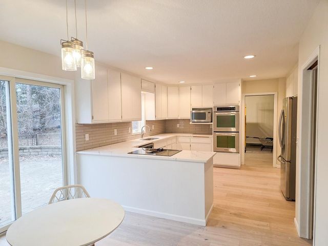 835 Vicksburg Lane N, Plymouth, MN 55447