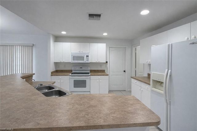 3215 13th ST SW, Lehigh Acres, FL 33976