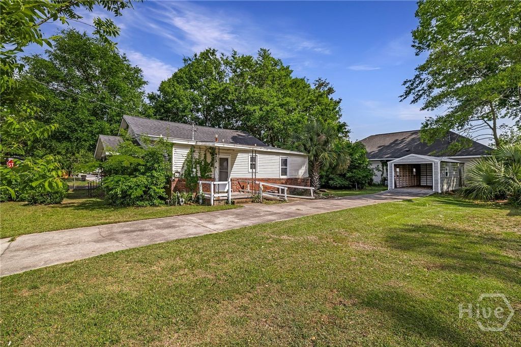 Image 1 of property listing at 919 E 70th Street, Savannah, GA 31405
