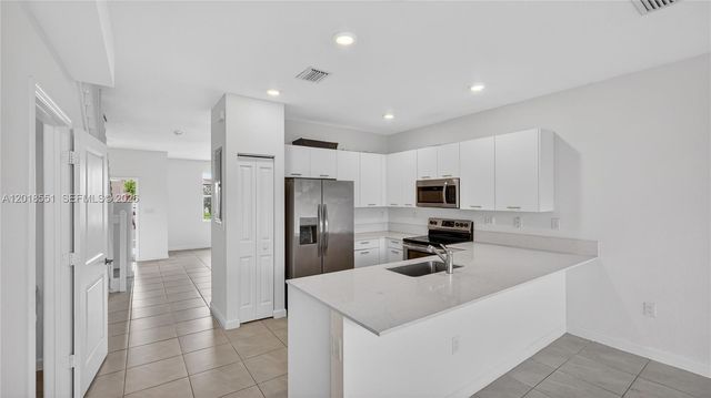 12123 NW 23rd Ct, Miami, FL 33167