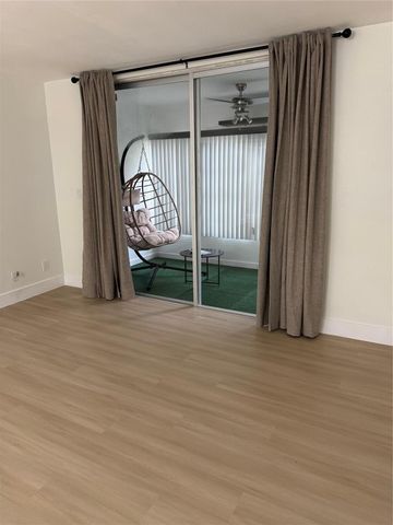 6051 NW 61st Avenue 205, Tamarac, FL 33319