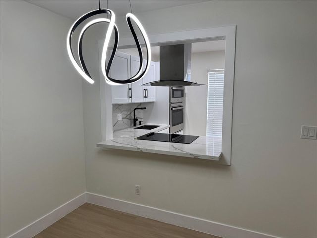 6051 NW 61st Avenue 205, Tamarac, FL 33319