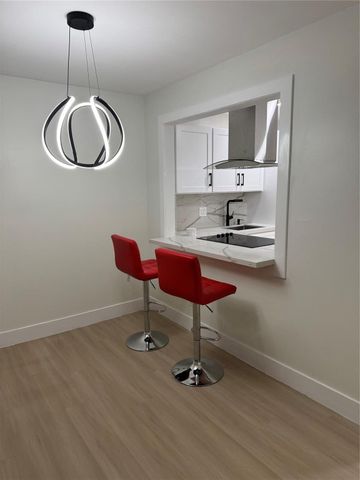 6051 NW 61st Avenue 205, Tamarac, FL 33319