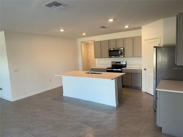 7232 BROAD RIVER AVENUE, Land O Lakes, FL 34638