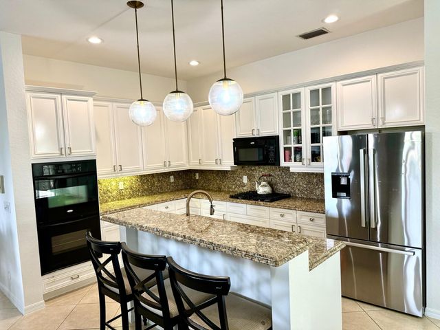 107 Via Escobar Place, Palm Beach Gardens, FL 33418