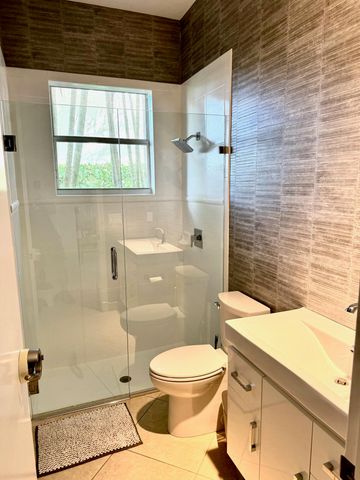 107 Via Escobar Place, Palm Beach Gardens, FL 33418