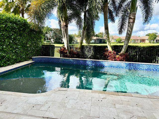 107 Via Escobar Place, Palm Beach Gardens, FL 33418