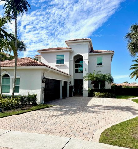 107 Via Escobar Place, Palm Beach Gardens, FL 33418