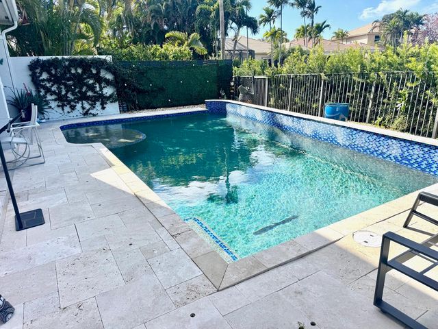 107 Via Escobar Place, Palm Beach Gardens, FL 33418