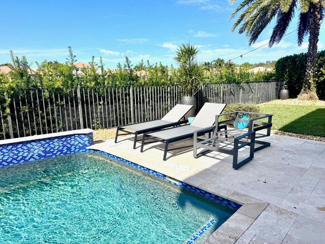 107 Via Escobar Place, Palm Beach Gardens, FL 33418