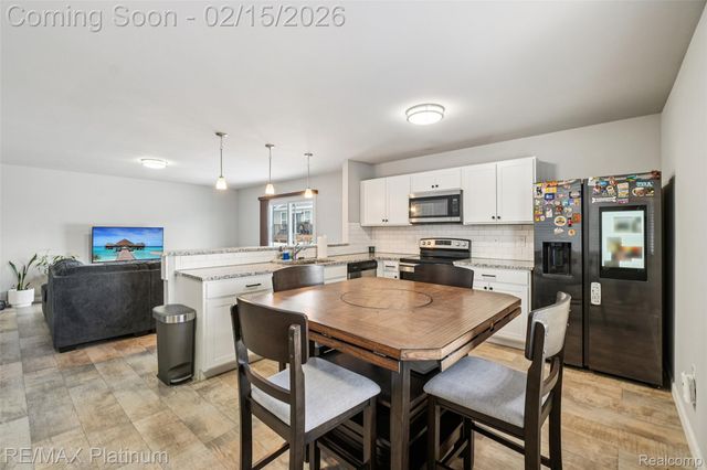 2840 Sycamore River Drive, Handy Township, MI 48836