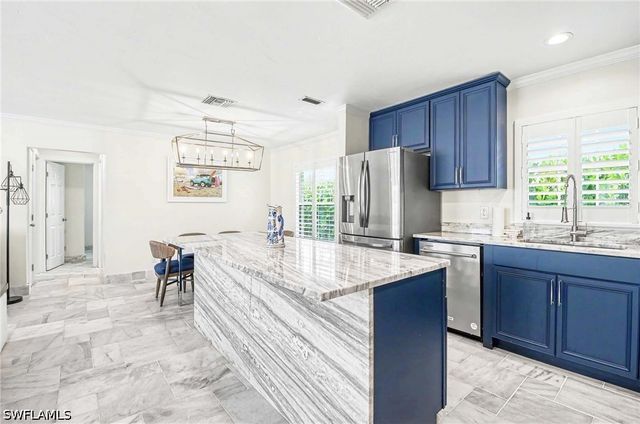 112 Capri BLVD, Naples, FL 34113