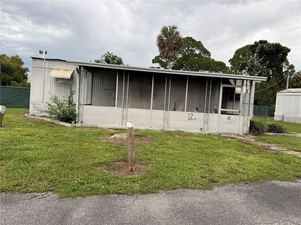 Image 4 of property listing at 6435 W HILLSBOROUGH AVENUE, Tampa, FL 33634