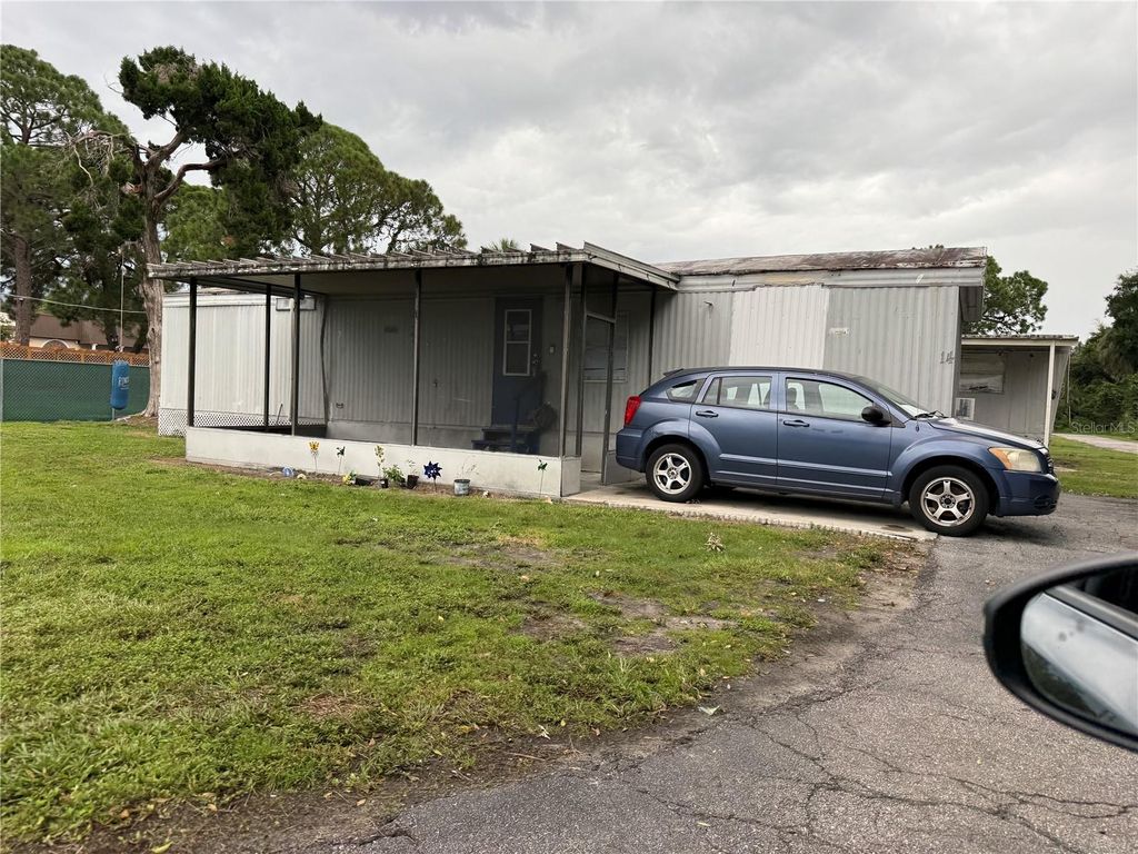 Image 5 of property listing at 6435 W HILLSBOROUGH AVENUE, Tampa, FL 33634