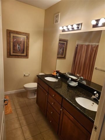 5257 CANE ISLAND LOOP 302, Kissimmee, FL 34746