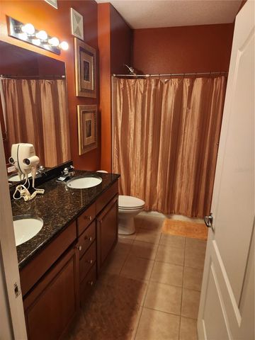 5257 CANE ISLAND LOOP 302, Kissimmee, FL 34746