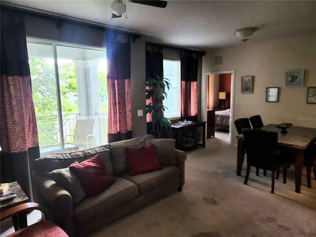 5257 CANE ISLAND LOOP 302, Kissimmee, FL 34746