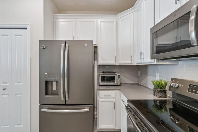 1006 BLACKWOLF RUN ROAD, Davenport, FL 33896