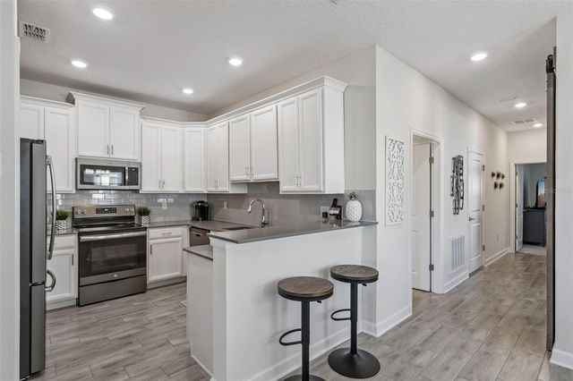 1006 BLACKWOLF RUN ROAD, Davenport, FL 33896