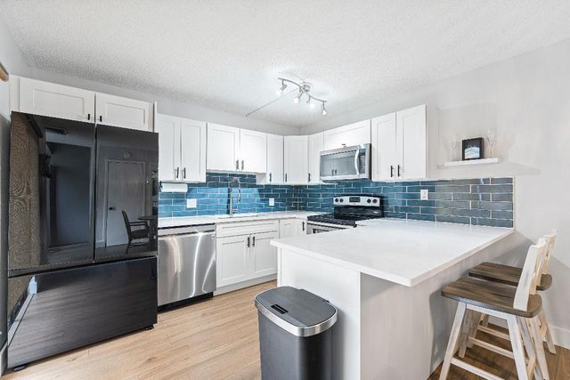 707 7th Court, Palm Beach Gardens, FL 33410