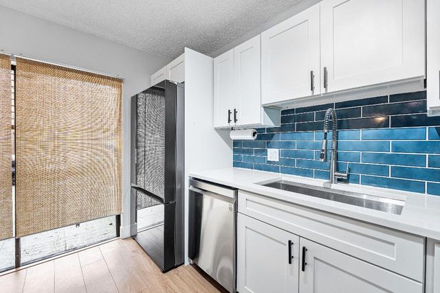 707 7th Court, Palm Beach Gardens, FL 33410