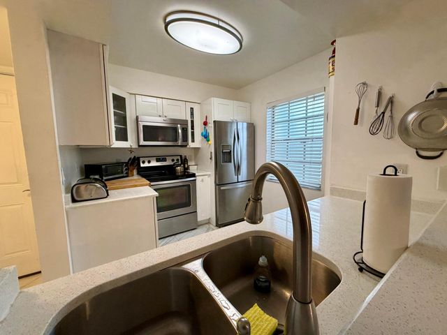 1105 Lake Shore Drive 104, Lake Park, FL 33403