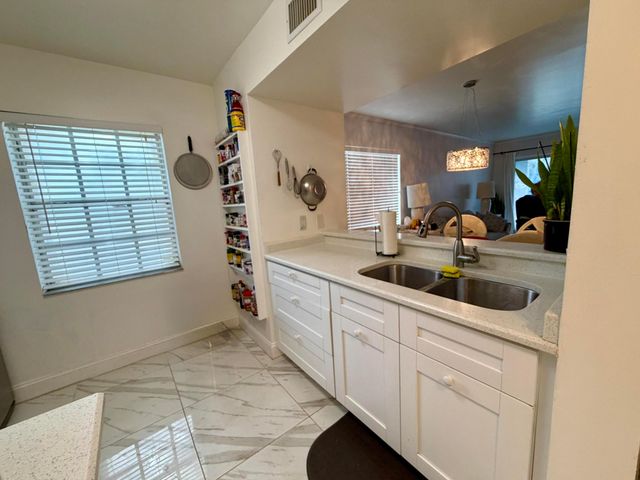 1105 Lake Shore Drive 104, Lake Park, FL 33403