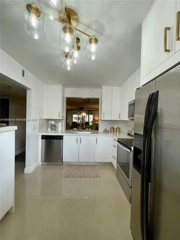 8592 W Sunrise Boulevard 111, Plantation, FL 33322