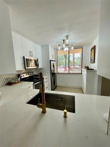 8592 W Sunrise Boulevard 111, Plantation, FL 33322