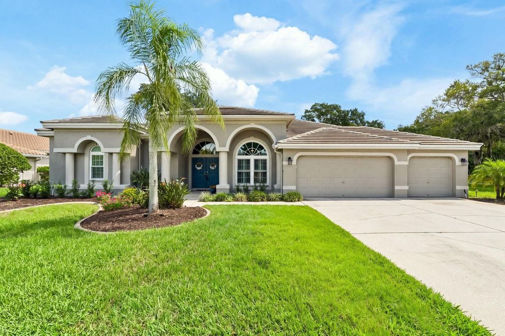 Image 2 of property listing at 1003 KINGS WAY LANE, Tarpon Springs, FL 34688