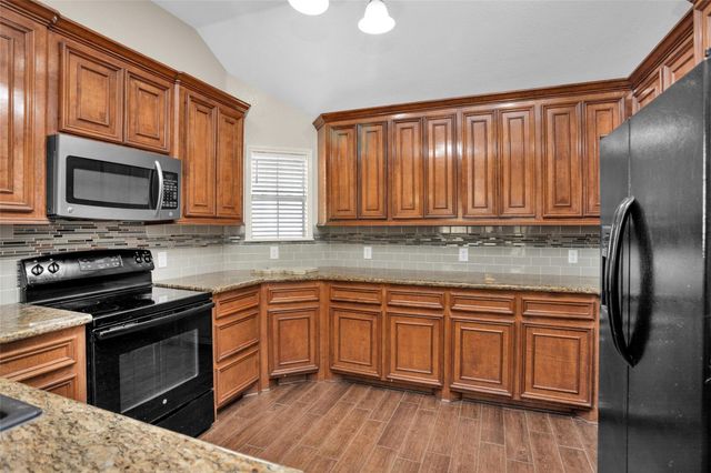 11210 Walden Road, Montgomery, TX 77356