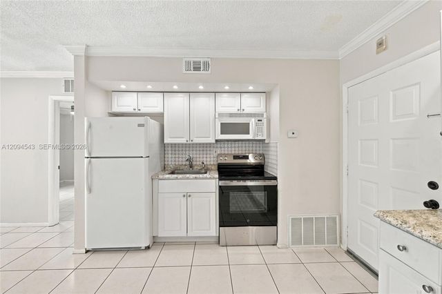 2700 Riverside Drive 302-B, Coral Springs, FL 33065