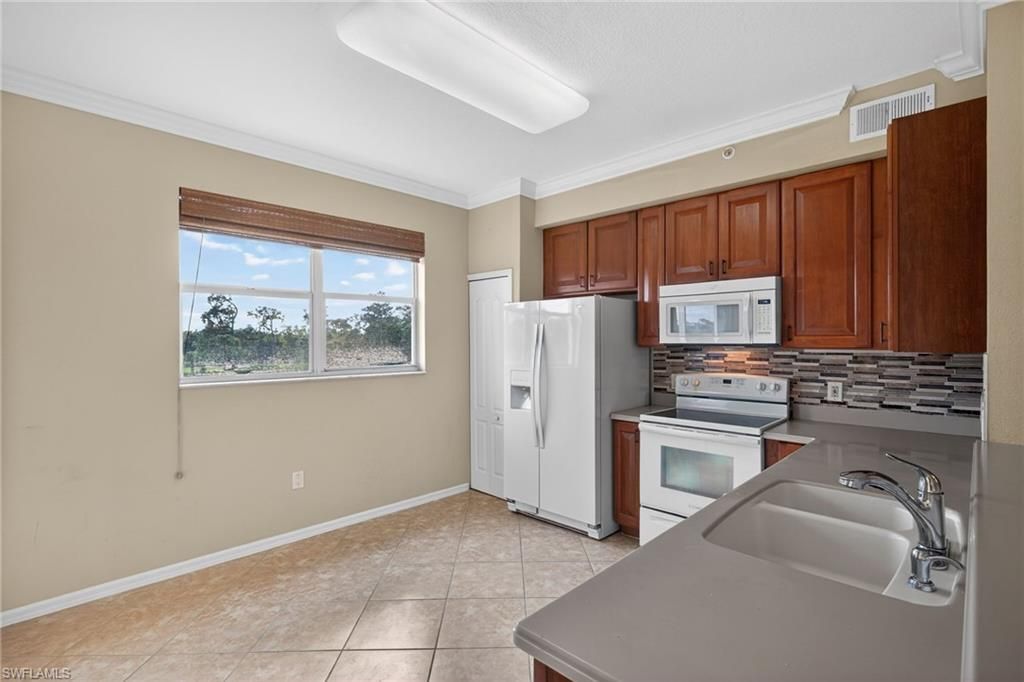 6816 STERLING GREENS PL 303, NAPLES, FL 34104 — photo 3