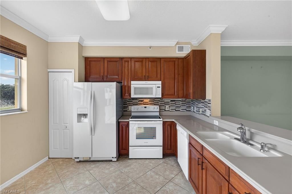 6816 STERLING GREENS PL 303, NAPLES, FL 34104 — photo 4