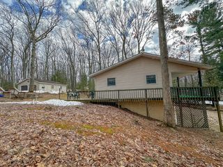 8827 W Elbow Drive, Elk Twp, MI 49644
