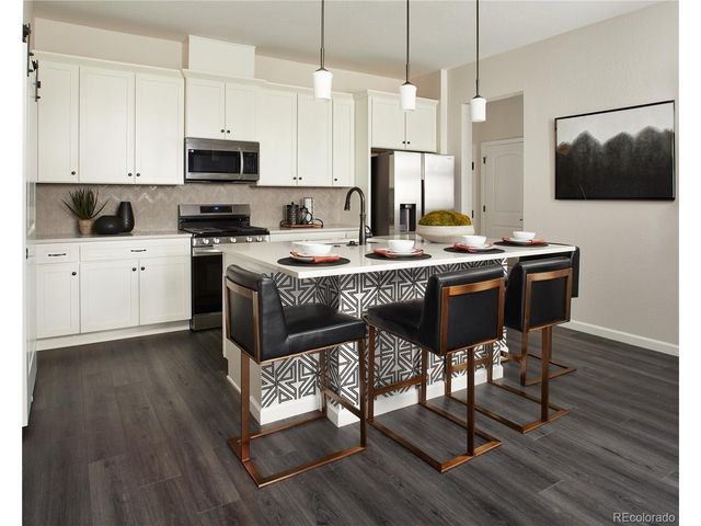 6153 N Ceylon St 3-104, Denver, CO 80249