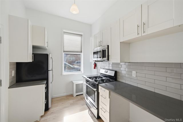 6803 76th Street, Middle Village, NY 11379