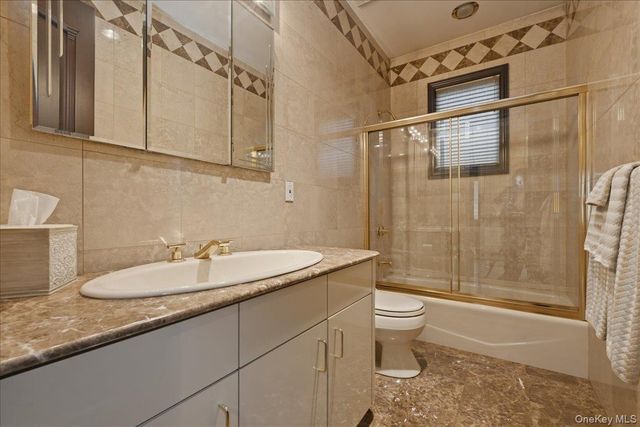 28-14 216th Street, Bayside, NY 11360