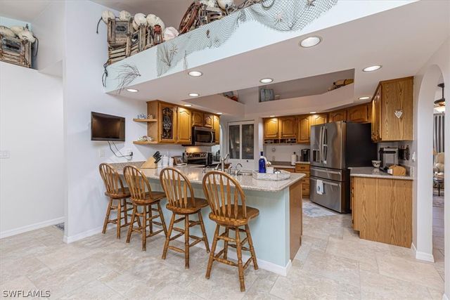 2442 Outrigger LN, Naples, FL 34104