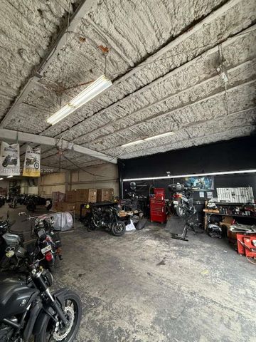 9355 NW South River Dr, Medley, FL 33166