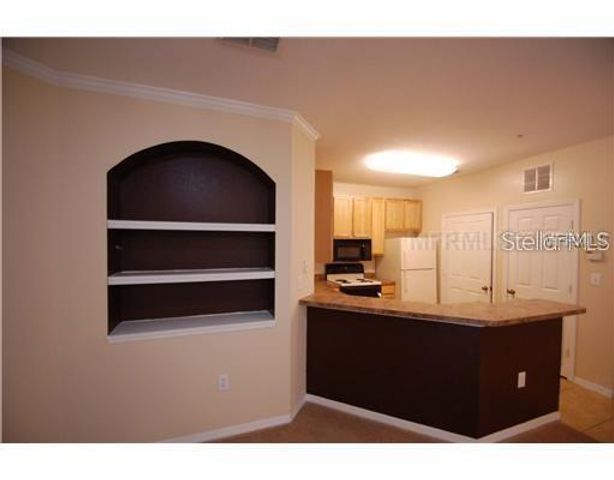 10021 COURTNEY PALMS BOULEVARD 202, Tampa, FL 33619