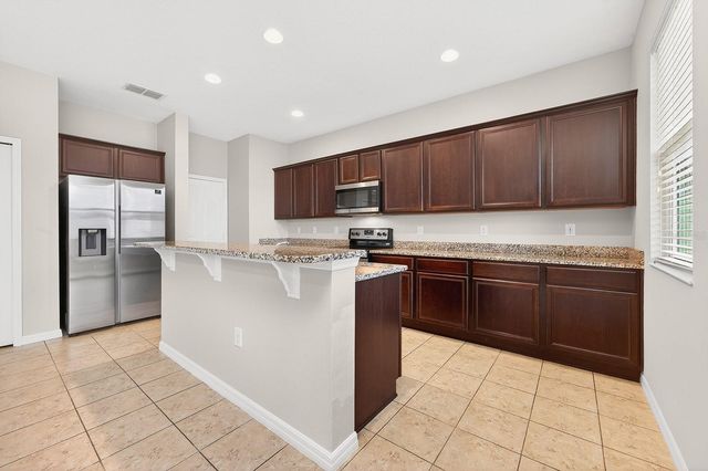 1709 CALM WATERS COURT, Tavares, FL 32778