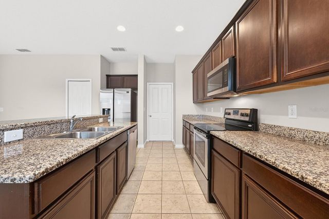 1709 CALM WATERS COURT, Tavares, FL 32778