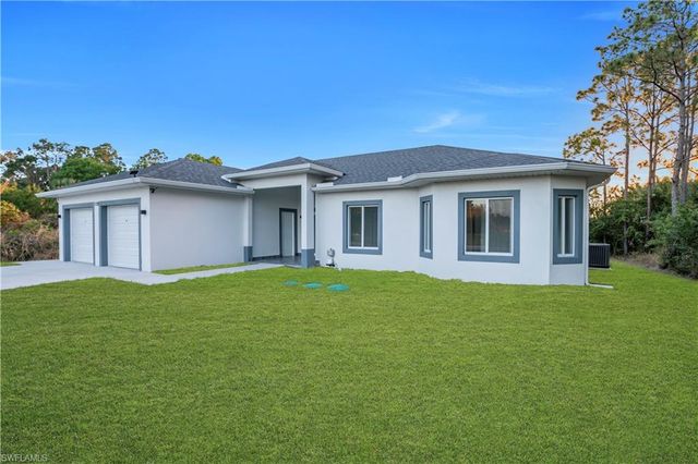 128 Bell BLVD S, Lehigh Acres, FL 33974